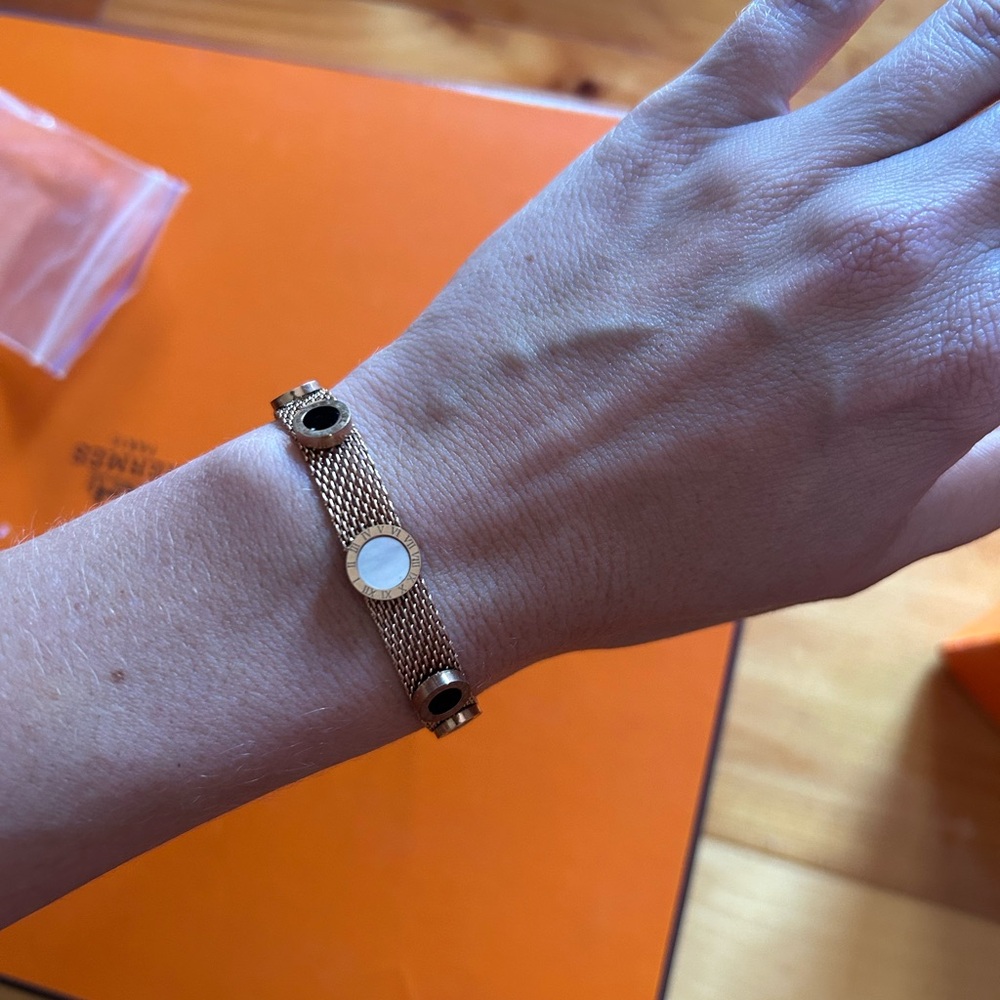Elegant Gold Bracelet with Black Accents